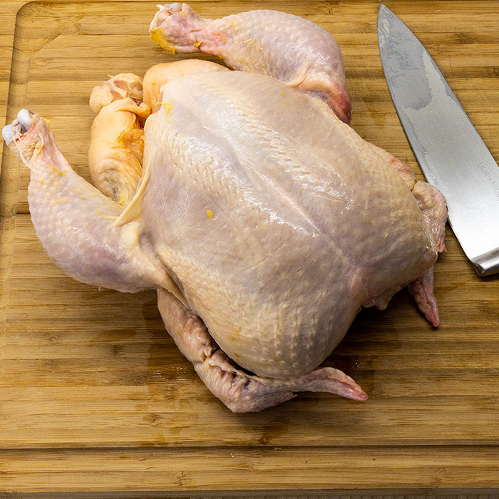 Raw Chicken Meat with White Chicken in Water